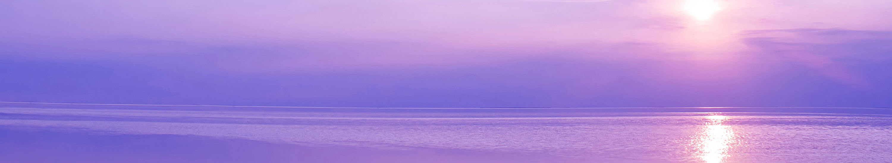 image of sunrise over water